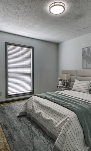 Upgraded carpeted bedroom at Park at 500